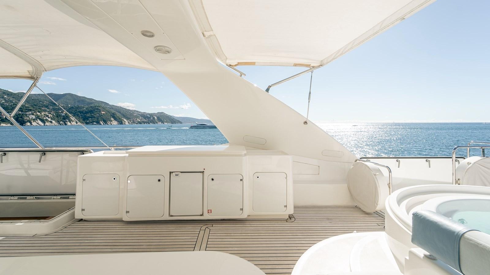 a boat with a sink and a view of the water aboard LADY HELENA Yacht for Sale