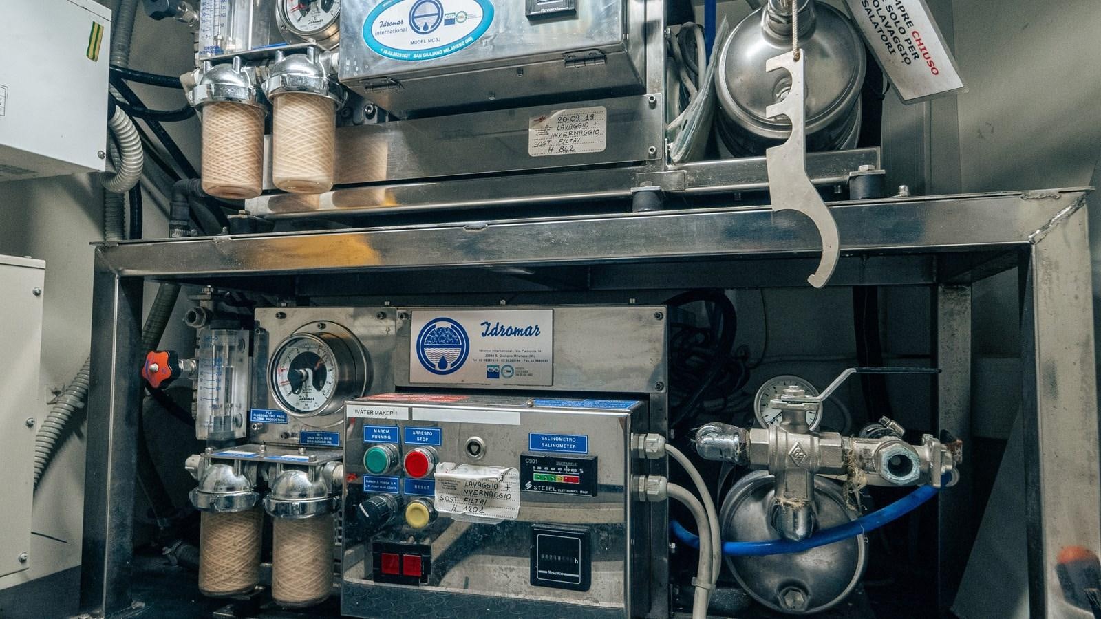 a machine with a large piece of equipment in it aboard LADY HELENA Yacht for Sale