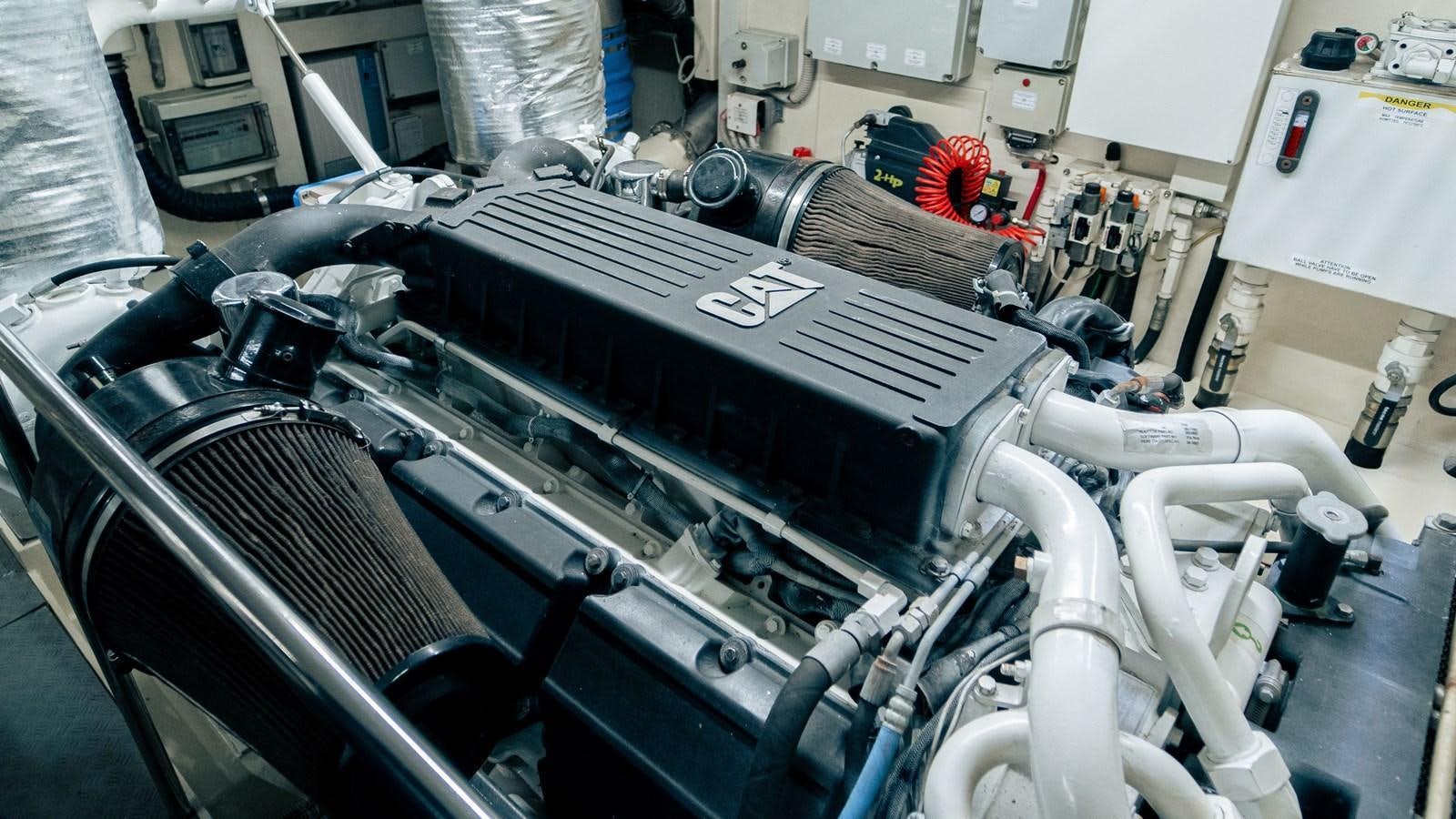 a machine with a large black object on the side aboard LADY HELENA Yacht for Sale