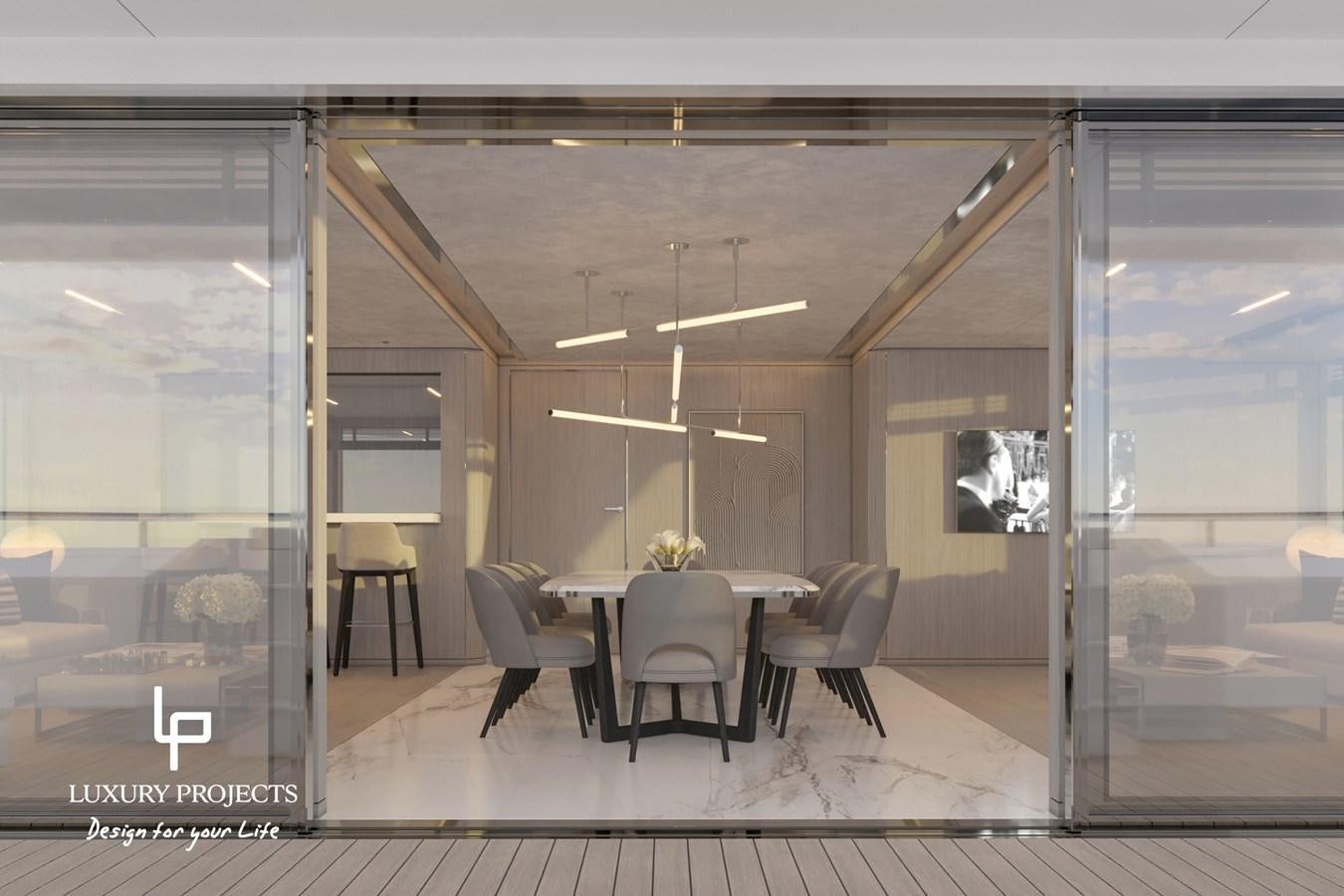 a room with a table and chairs aboard SPACELINE 88 Yacht for Sale