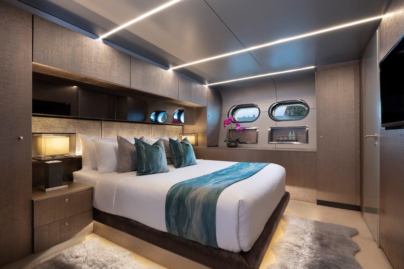 a bed in a room aboard OCEAN EMERALD Yacht for Sale