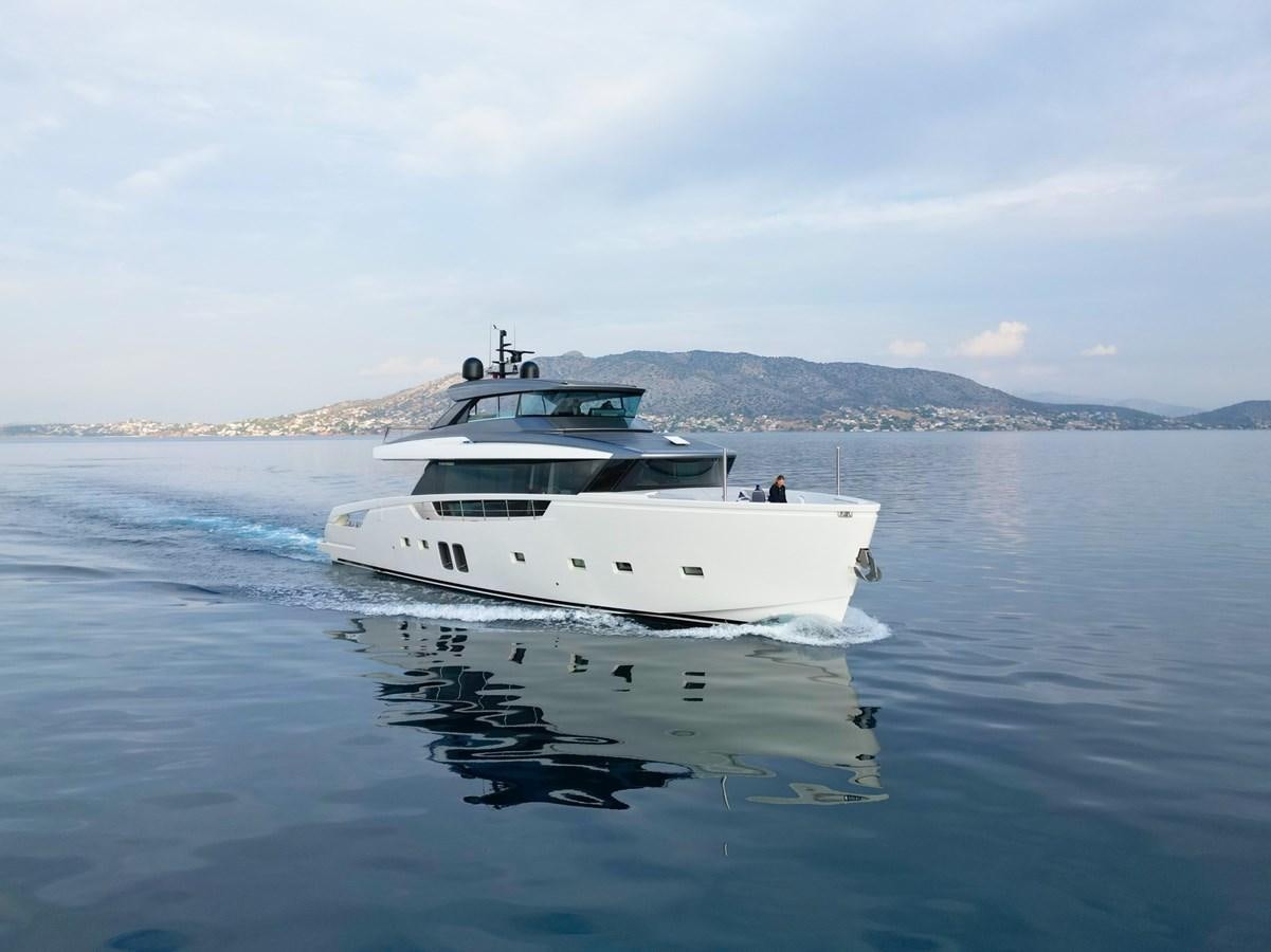 a white yacht on the water aboard LOVE IS IN THE AIR Yacht for Sale