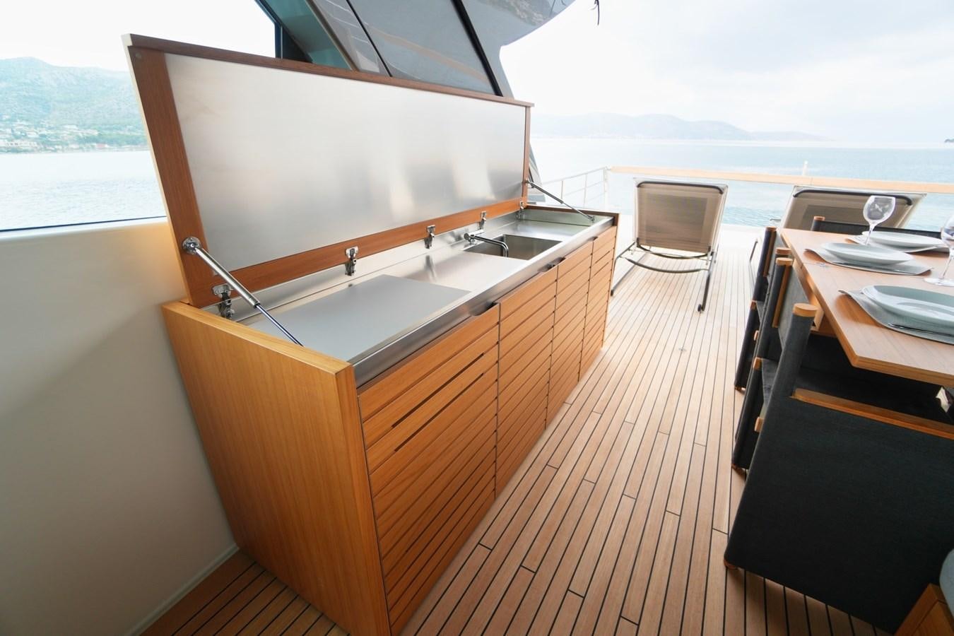 a boat on a deck aboard LOVE IS IN THE AIR Yacht for Sale