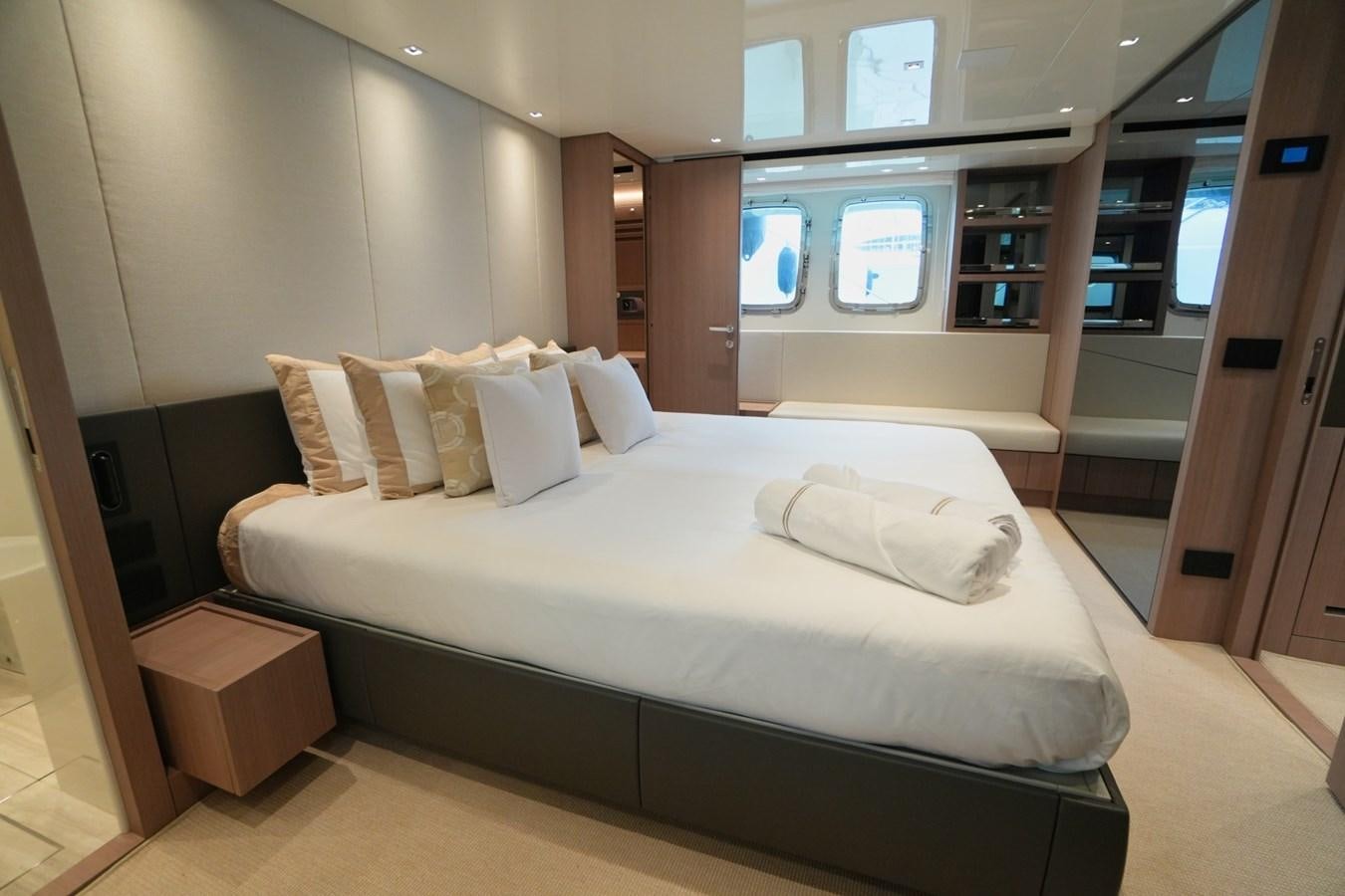 a bed in a room aboard LOVE IS IN THE AIR Yacht for Sale