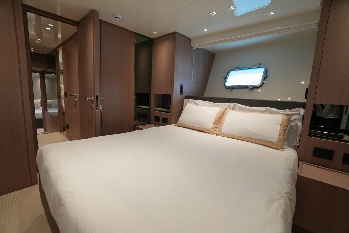 a bed in a room aboard LOVE IS IN THE AIR Yacht for Sale
