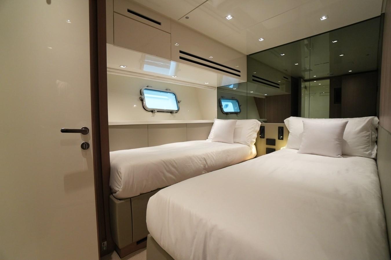 a room with two beds aboard LOVE IS IN THE AIR Yacht for Sale