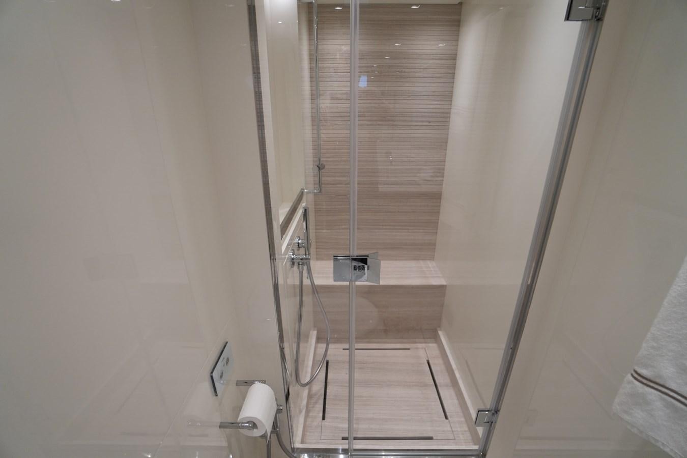 a bathroom with a shower aboard LOVE IS IN THE AIR Yacht for Sale