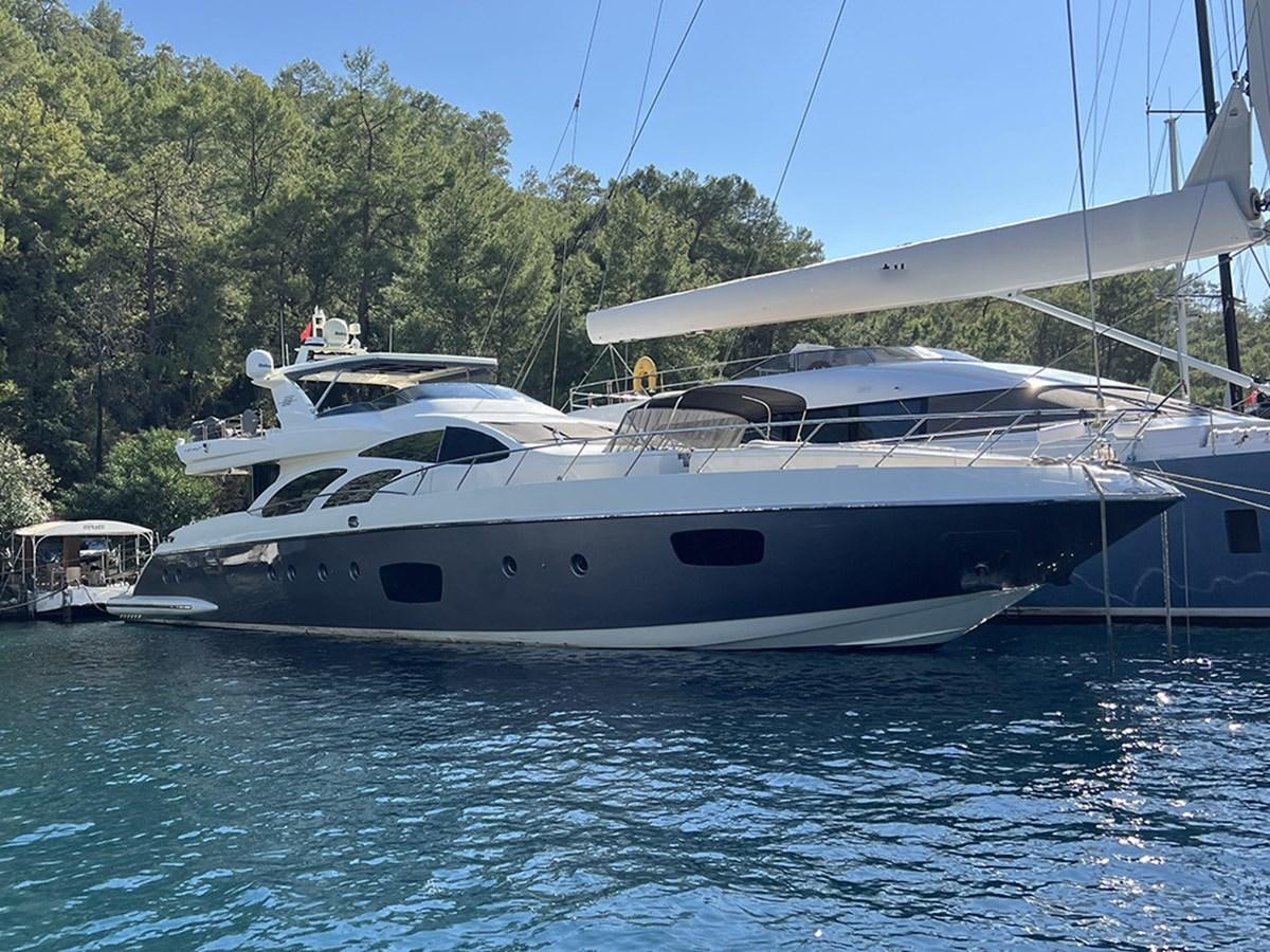 a couple of boats in a harbor aboard AZIMUT 98 2009 Yacht for Sale