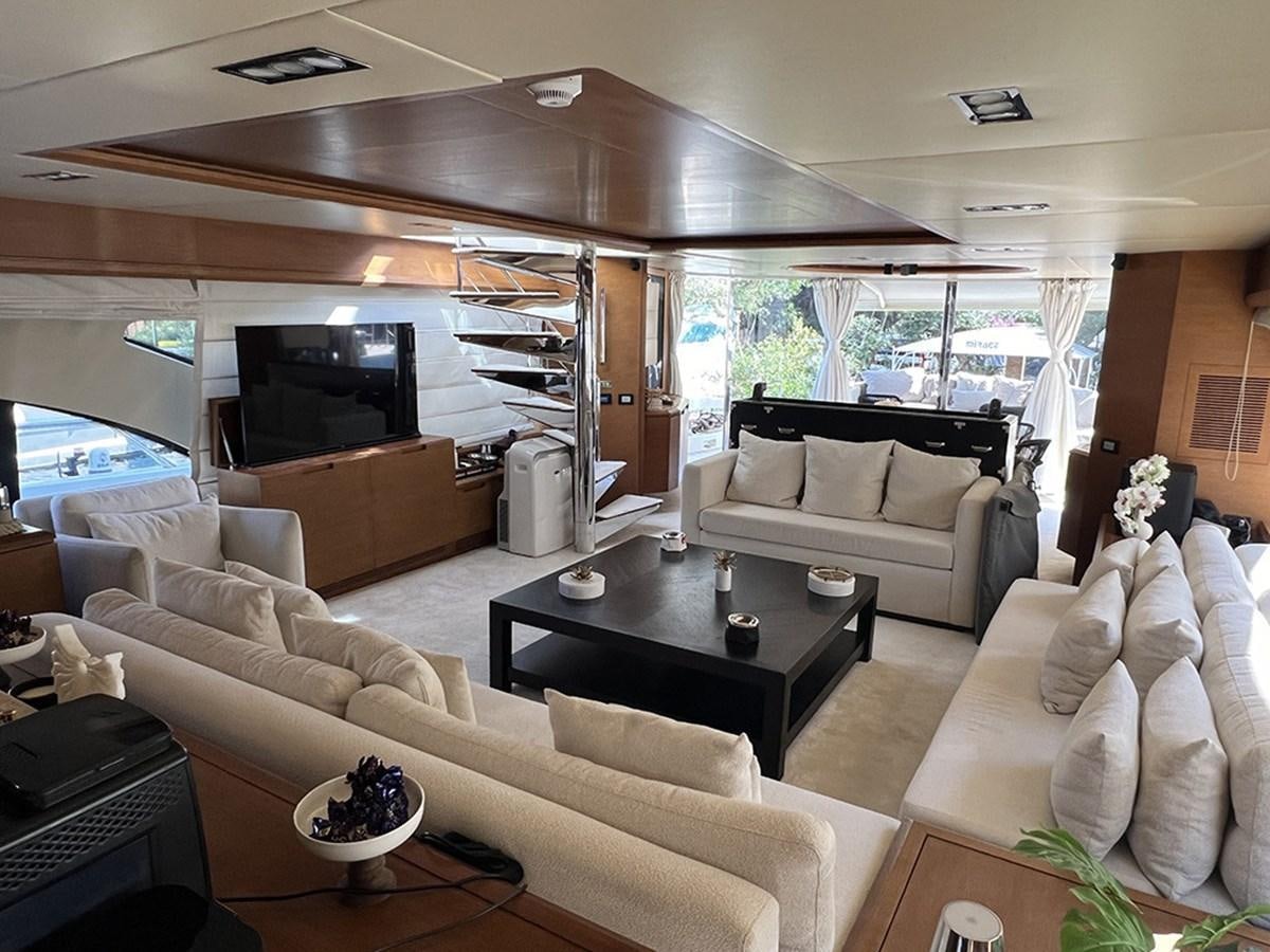 a living room with a large window aboard AZIMUT 98 2009 Yacht for Sale