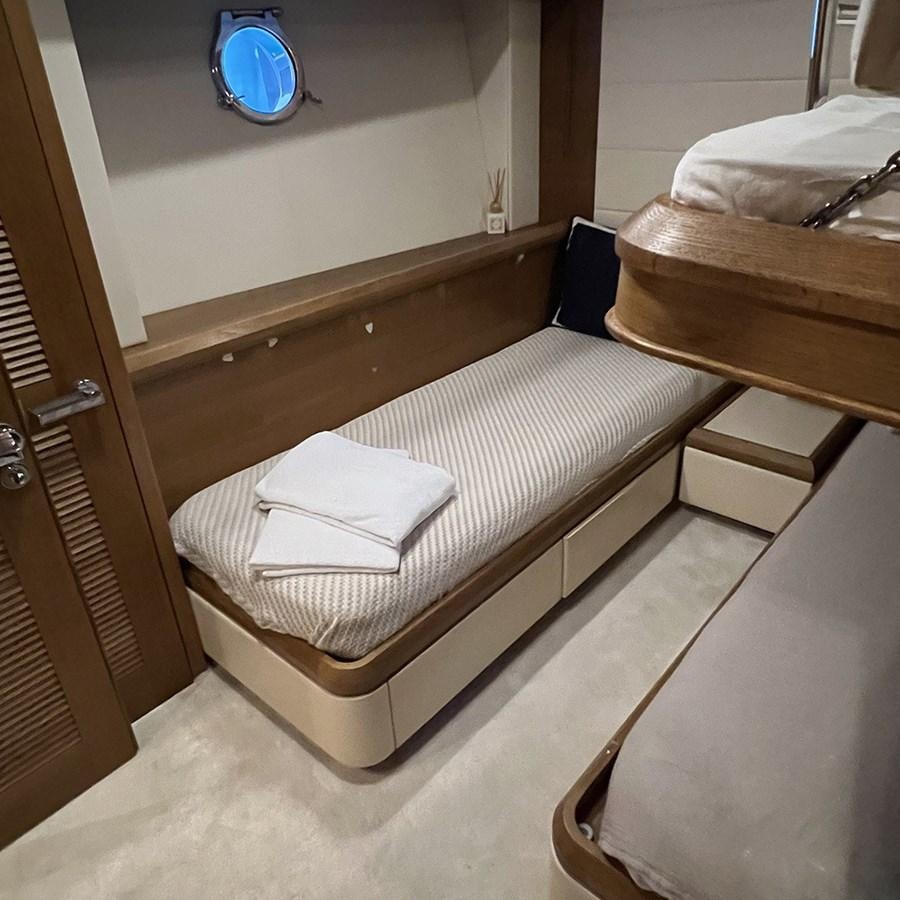 a bed in a room aboard AZIMUT 98 2009 Yacht for Sale