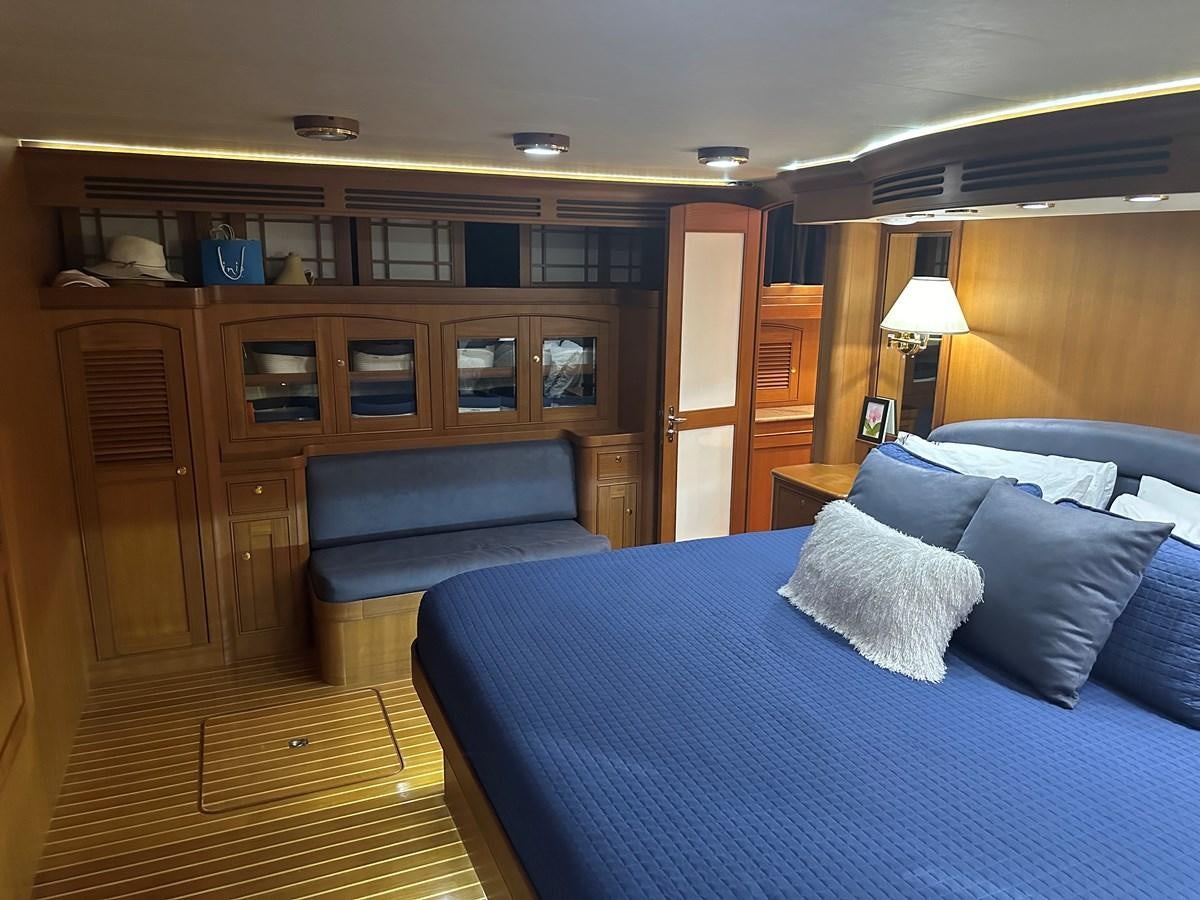 a bed in a room aboard BANDOL Yacht for Sale