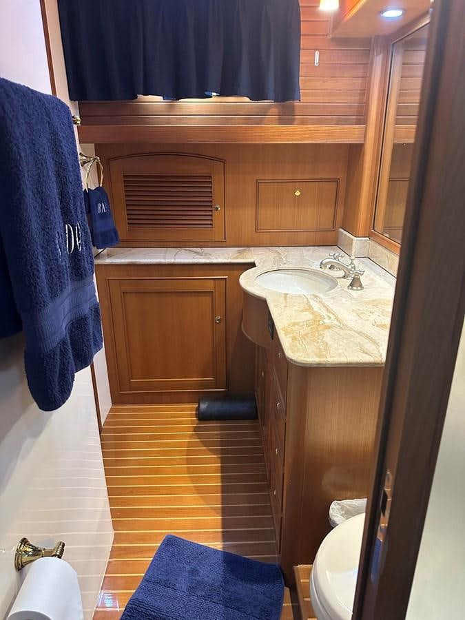a bathroom with a sink and a toilet aboard BANDOL Yacht for Sale