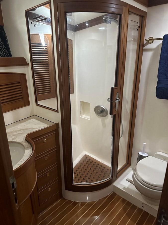 a bathroom with a standup shower aboard BANDOL Yacht for Sale