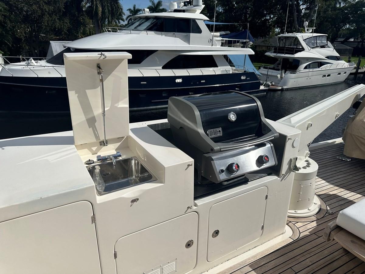 a boat docked at a pier aboard BANDOL Yacht for Sale