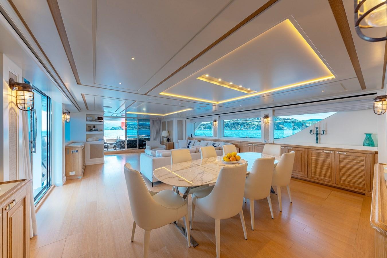a large kitchen with white tables aboard MY WAY Yacht for Sale