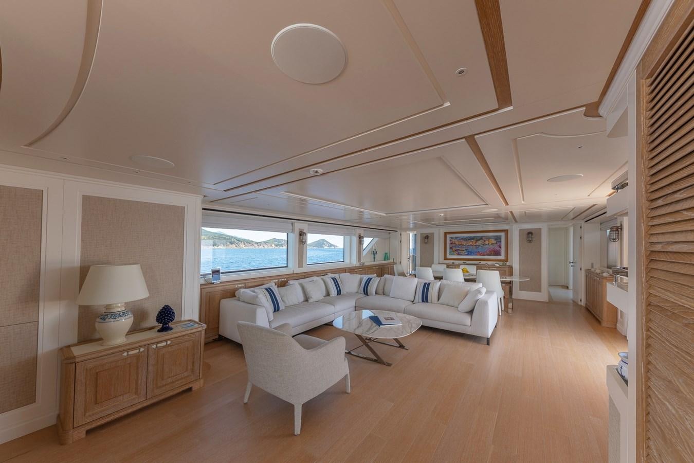 a living room with a wood floor aboard MY WAY Yacht for Sale