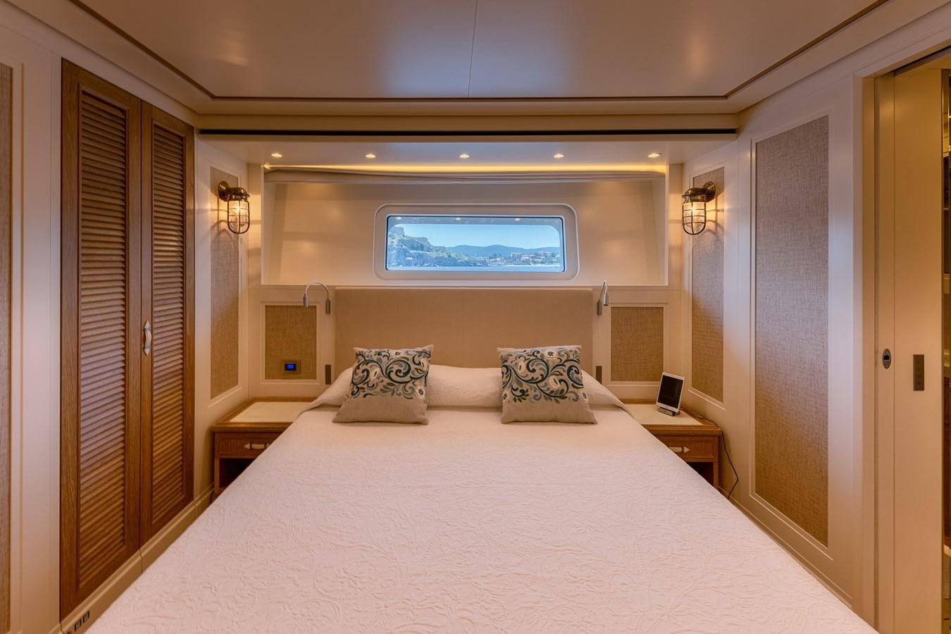 a bed with pillows on it aboard MY WAY Yacht for Sale