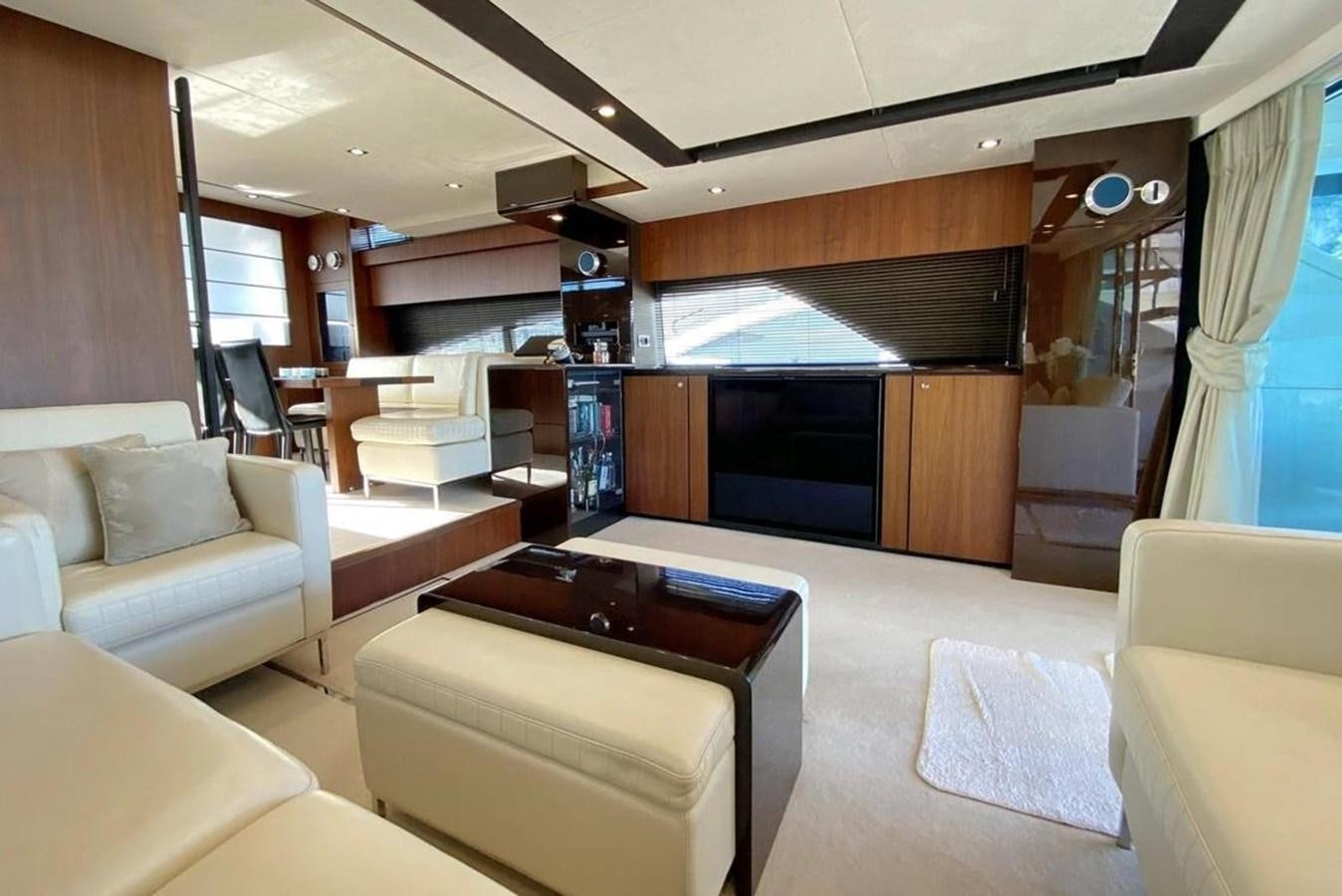 a room with a couch and a tv aboard SQUADRON 80 Yacht for Sale