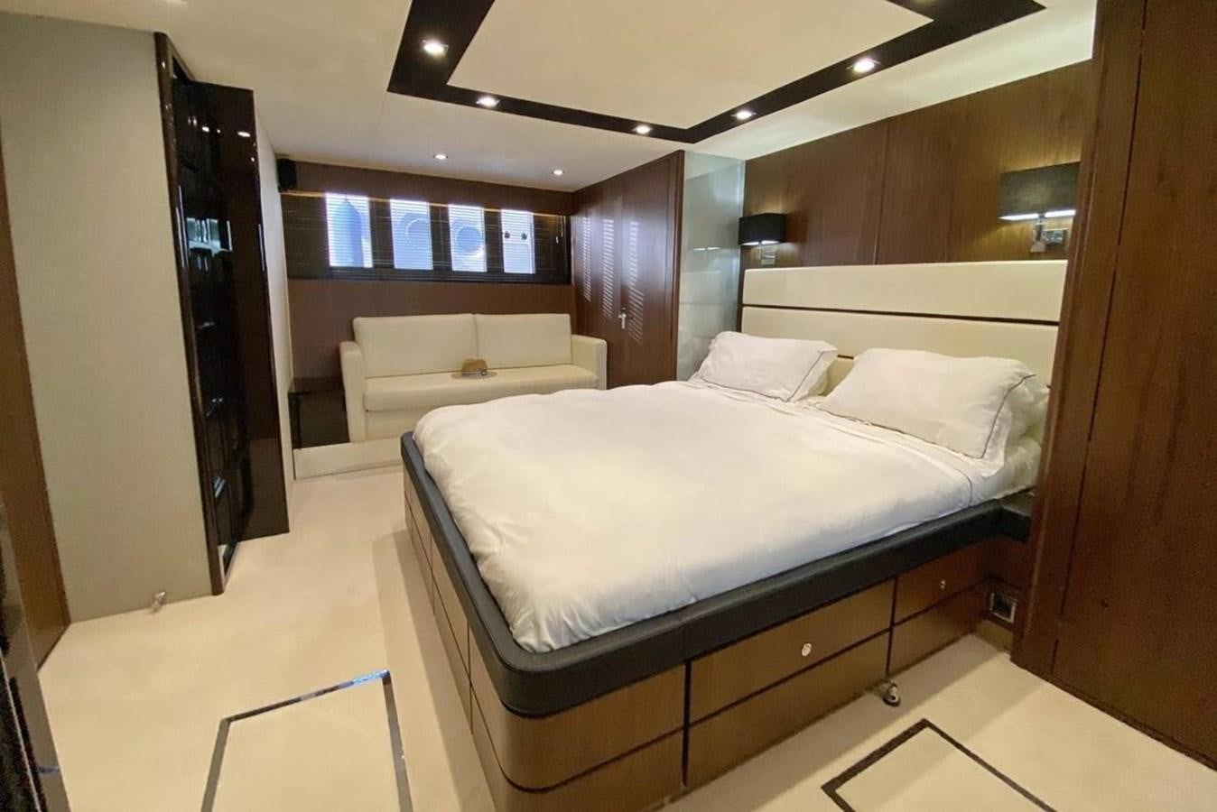 a room with a bed and a couch aboard SQUADRON 80 Yacht for Sale