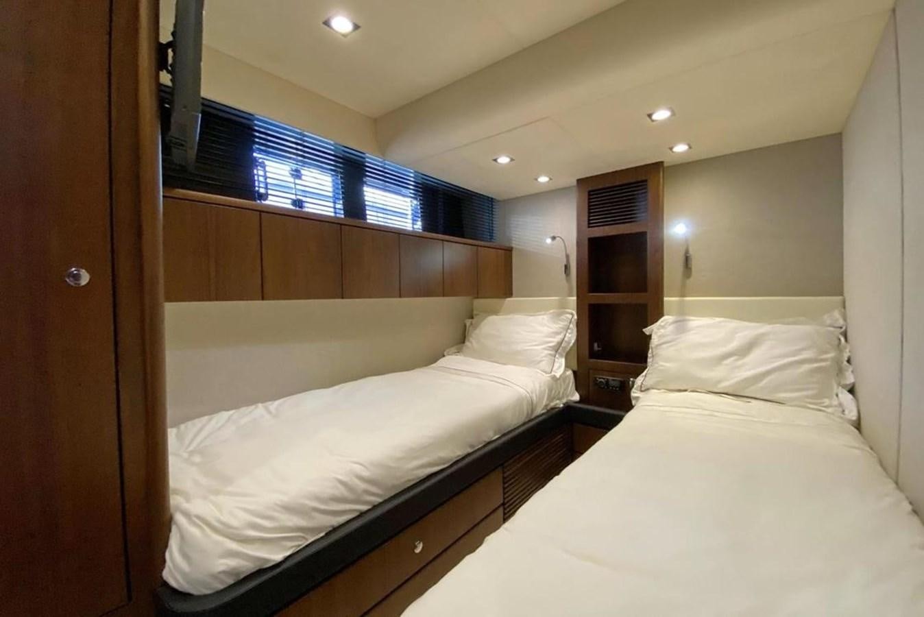 a room with two beds aboard SQUADRON 80 Yacht for Sale