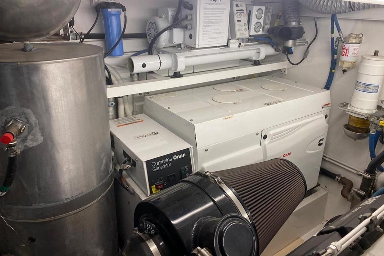 a machine with a large metal cylinder aboard SQUADRON 80 Yacht for Sale