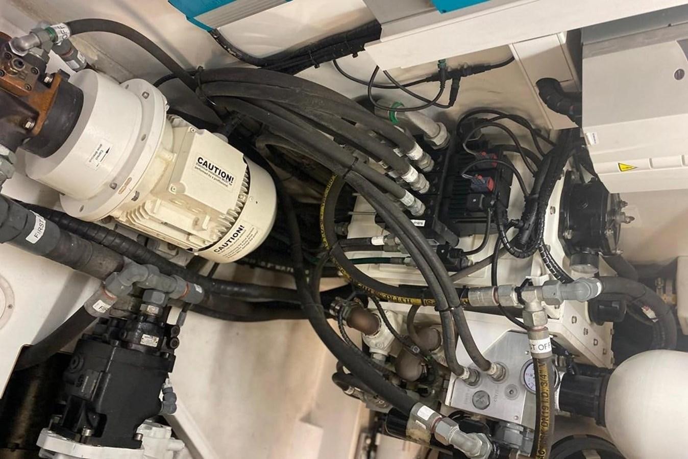 a close-up of a car engine aboard SQUADRON 80 Yacht for Sale