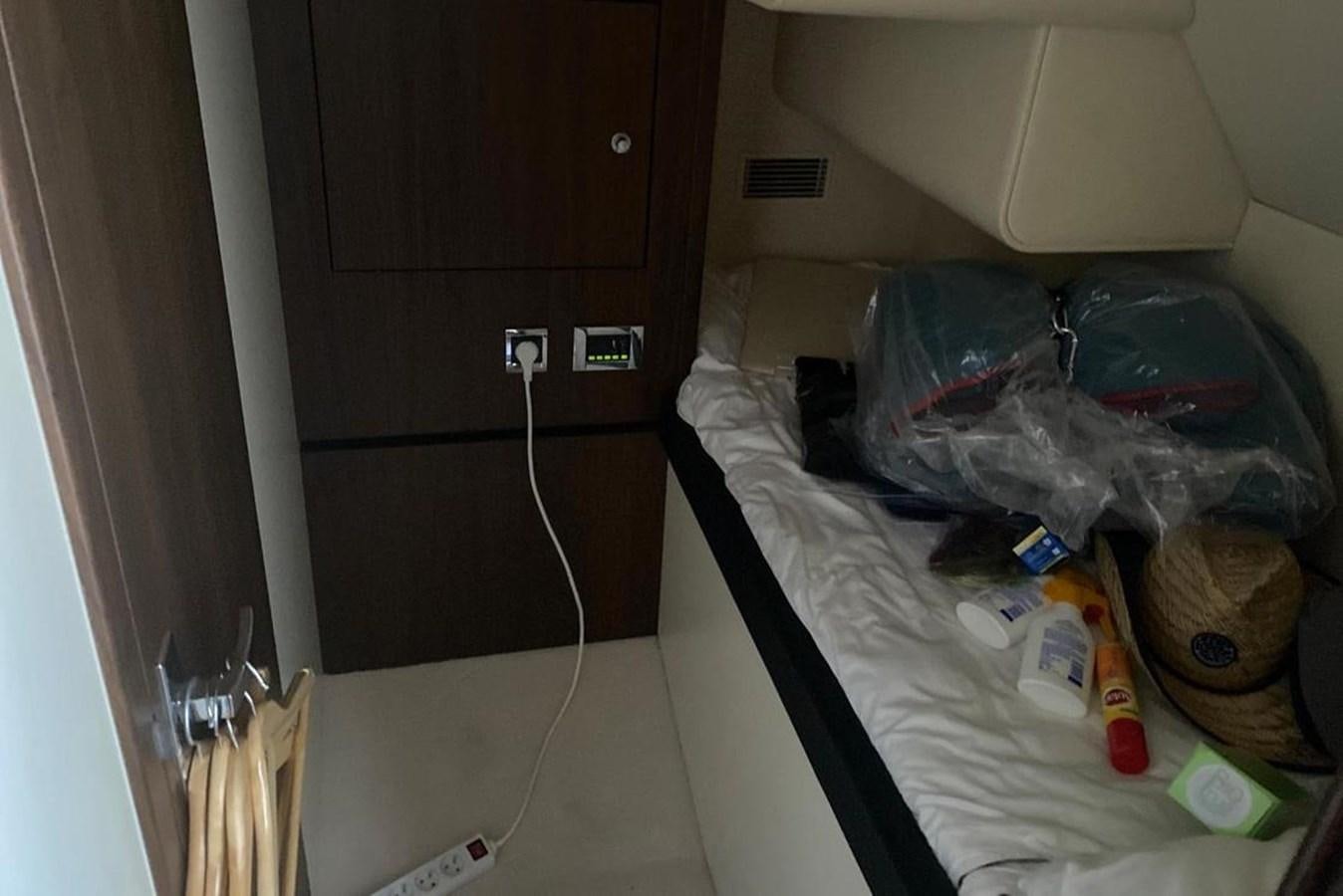 a messy room with a bag and a bag of food aboard SQUADRON 80 Yacht for Sale
