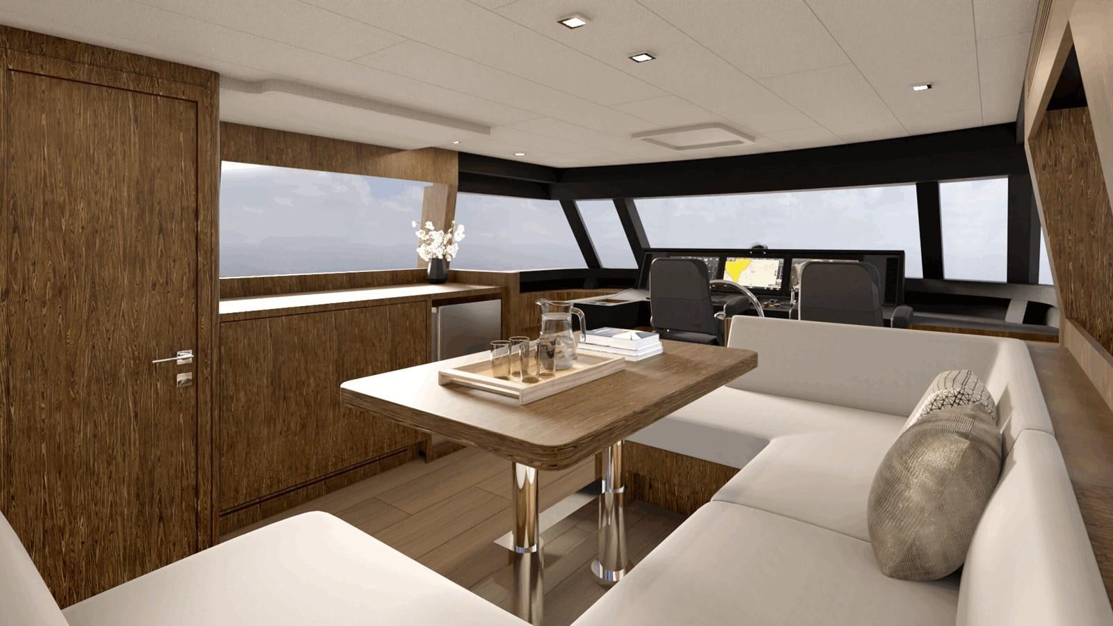 a room with a table and couch aboard HORIZON V68 Yacht for Sale