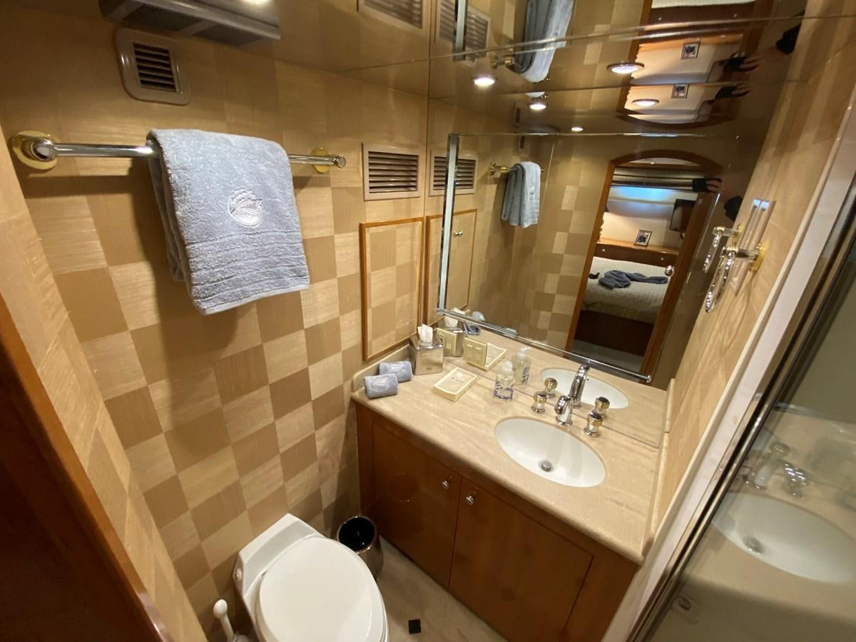 a bathroom with a sink and a toilet aboard DREAM ON Yacht for Sale