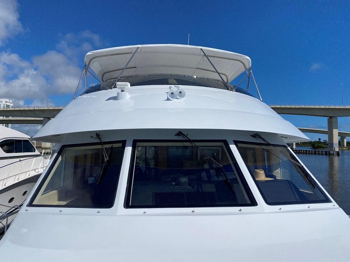 a white yacht on the water aboard DREAM ON Yacht for Sale