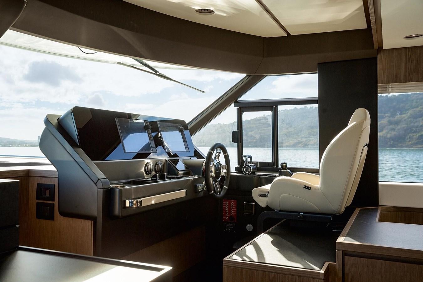 a car parked in a room aboard AZIMUT MAGELLANO 66 Yacht for Sale