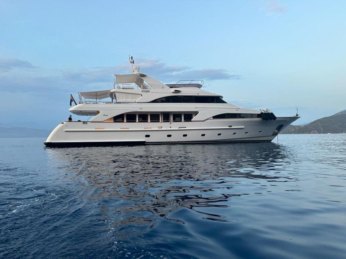 a white yacht in the water aboard FRIENDSHIP Yacht for Sale