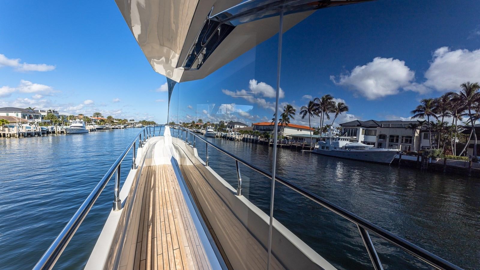 a wooden bridge over water aboard ISLA BONITA Yacht for Sale