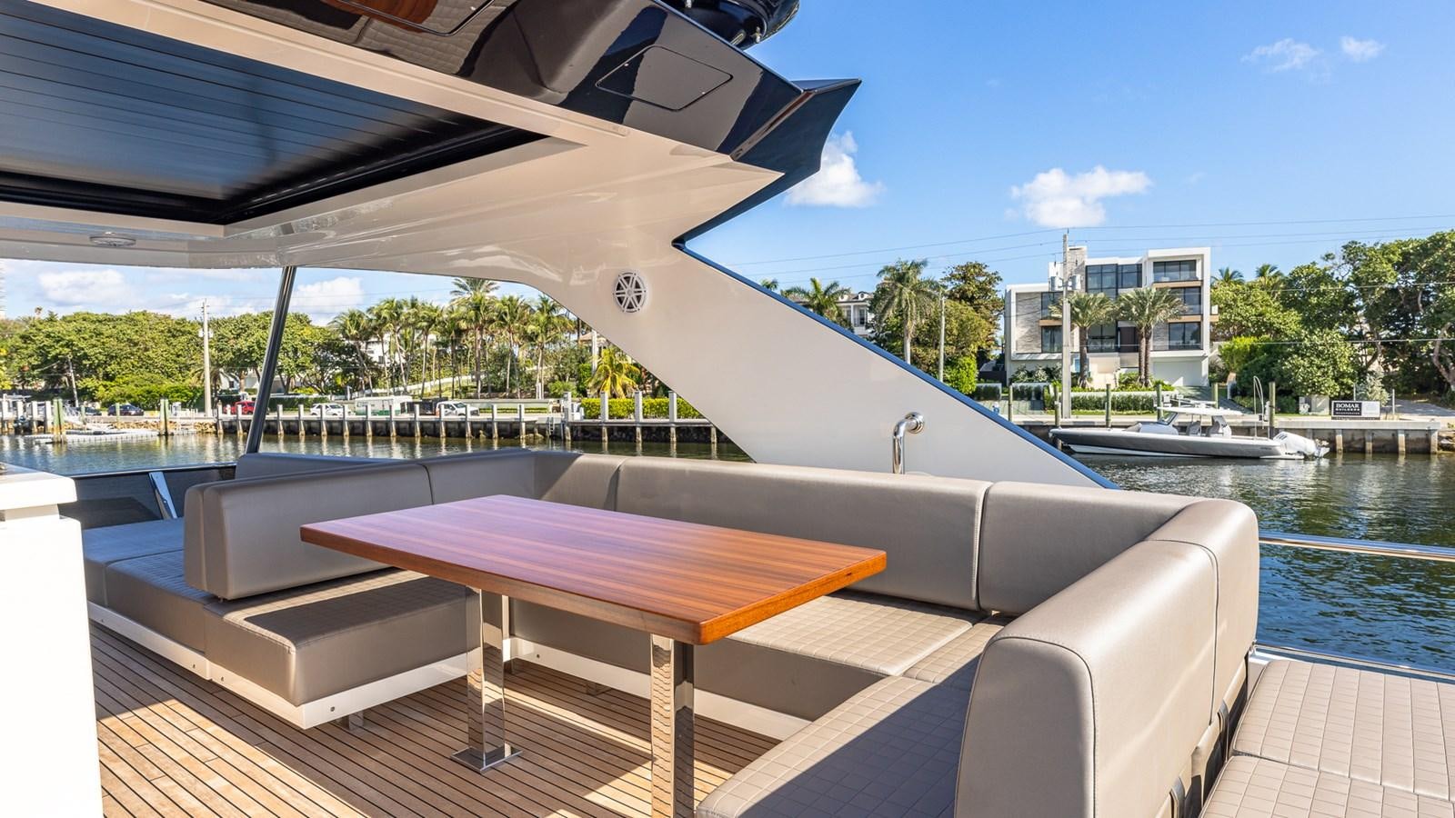 a table on a deck aboard ISLA BONITA Yacht for Sale