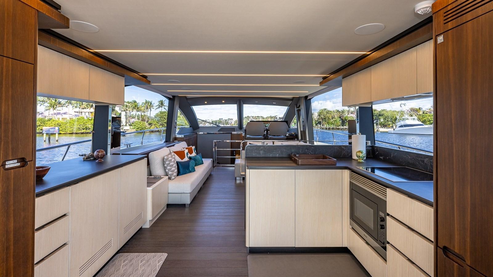 a kitchen with a large window aboard ISLA BONITA Yacht for Sale
