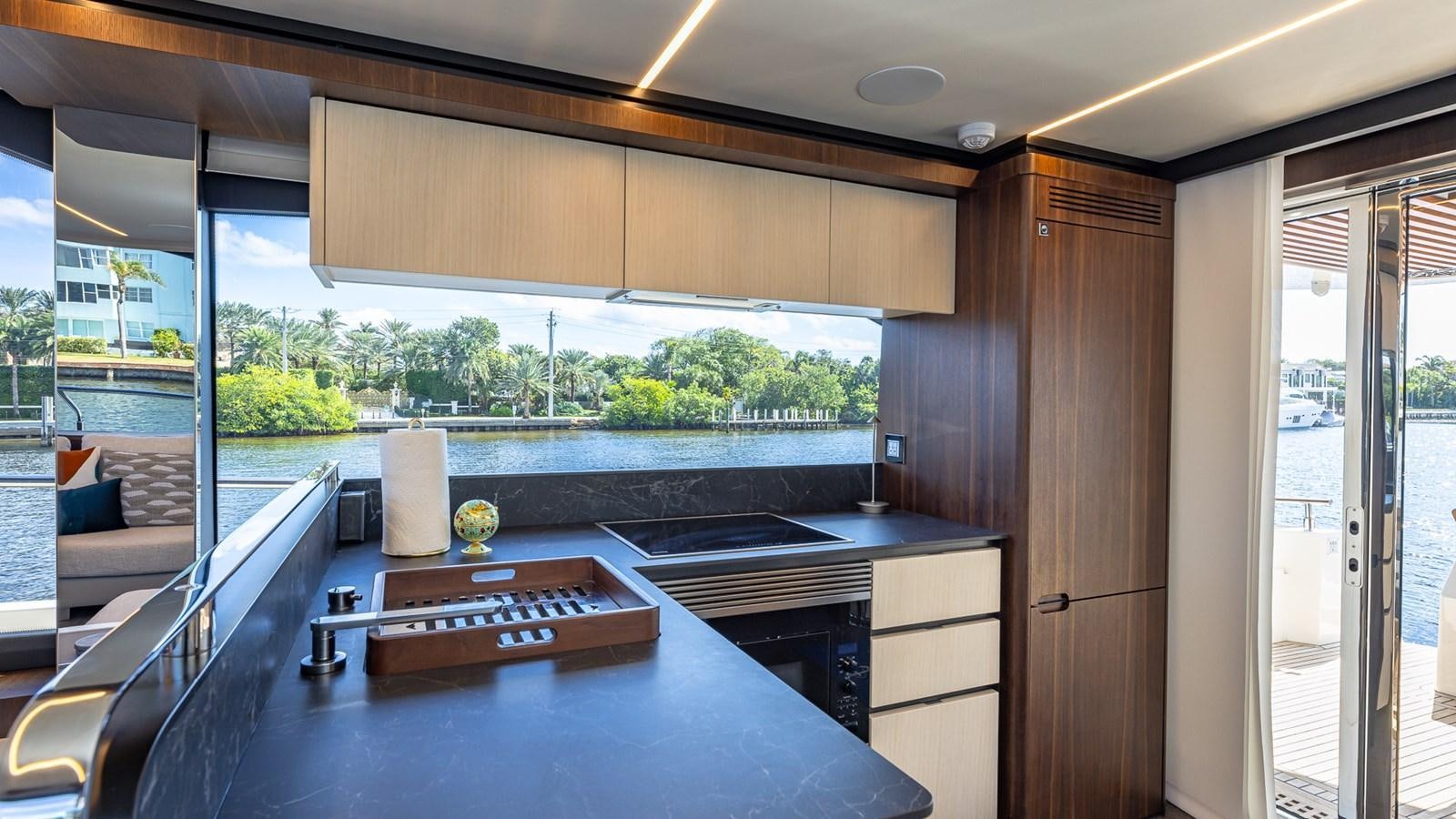 a kitchen and living room aboard ISLA BONITA Yacht for Sale