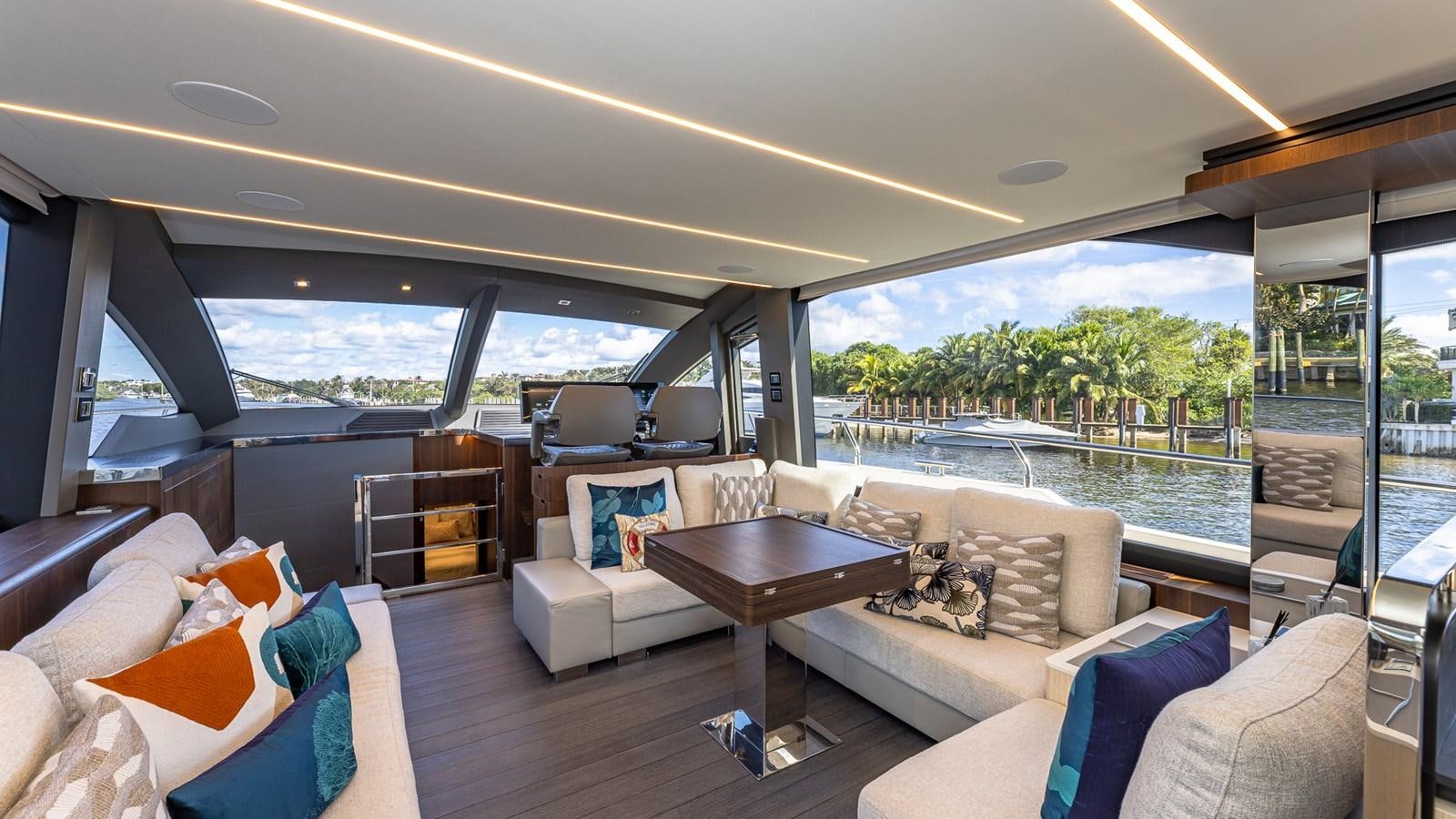 a living room with a large window aboard ISLA BONITA Yacht for Sale