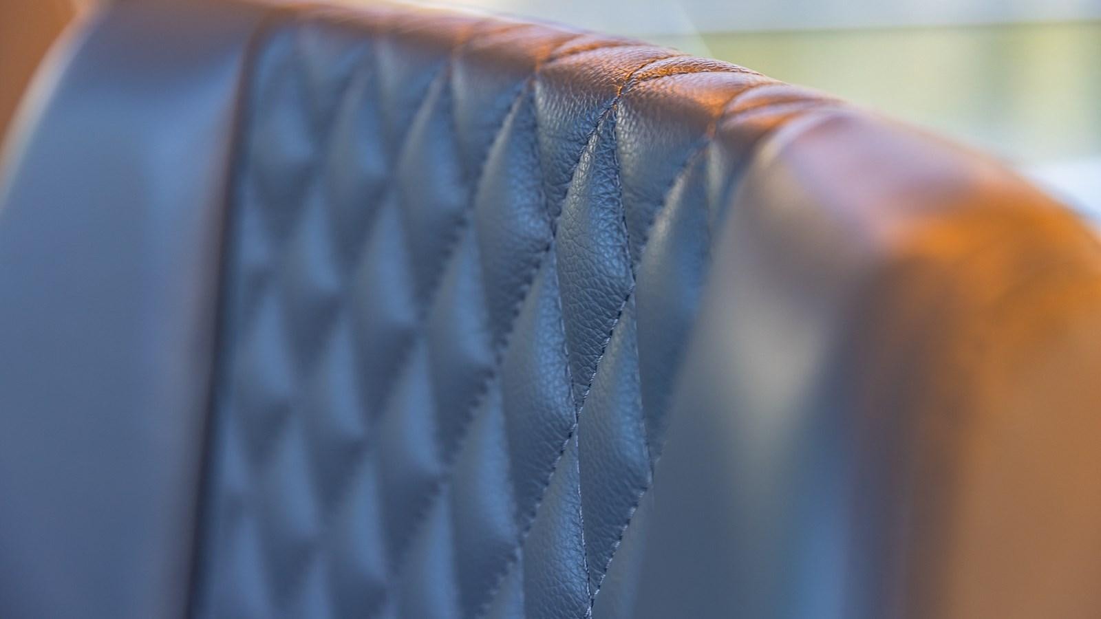 a close-up of a man's blue shirt aboard ISLA BONITA Yacht for Sale