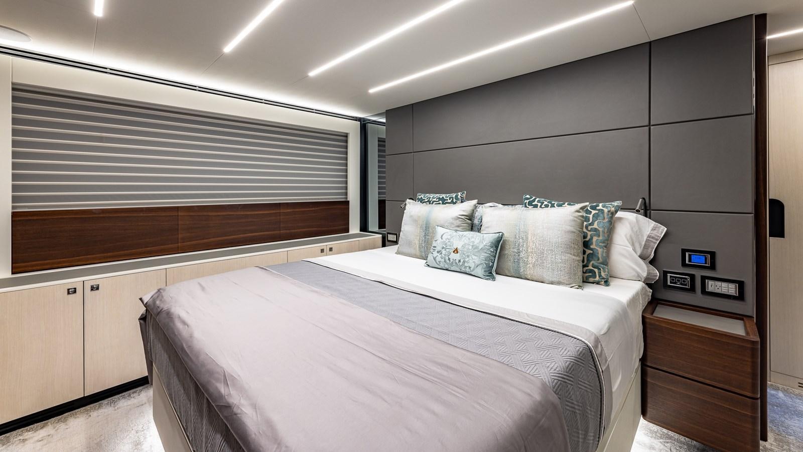 a bed in a room aboard ISLA BONITA Yacht for Sale