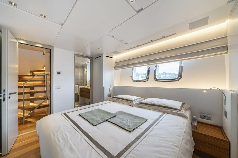 a bed in a room aboard SALT Yacht for Charter