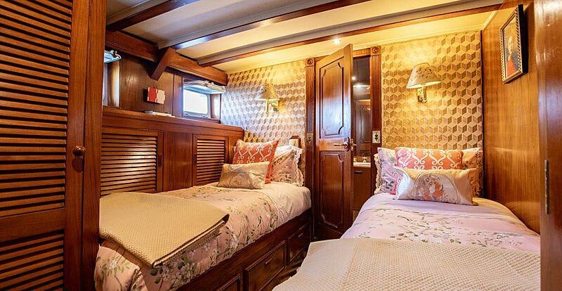 a room with two beds aboard SEA BREEZE III Yacht for Charter