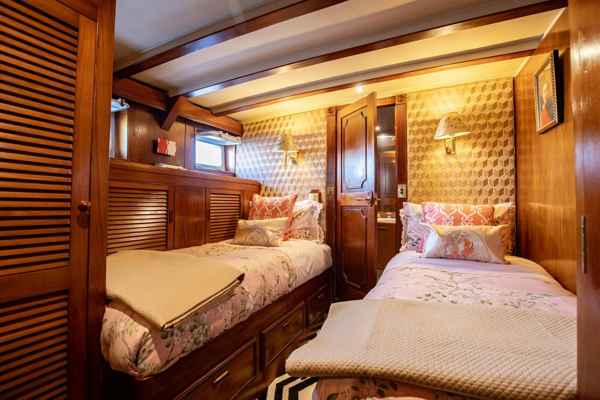 a room with two beds aboard SEA BREEZE III Yacht for Charter