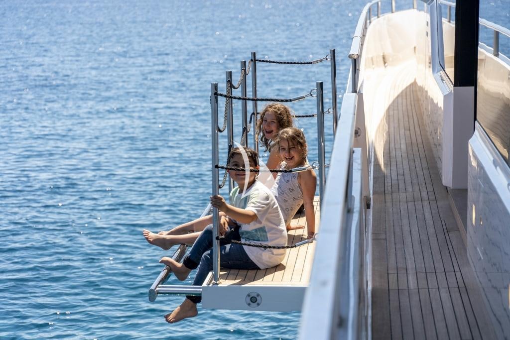a group of people on a boat aboard SALT Yacht for Charter
