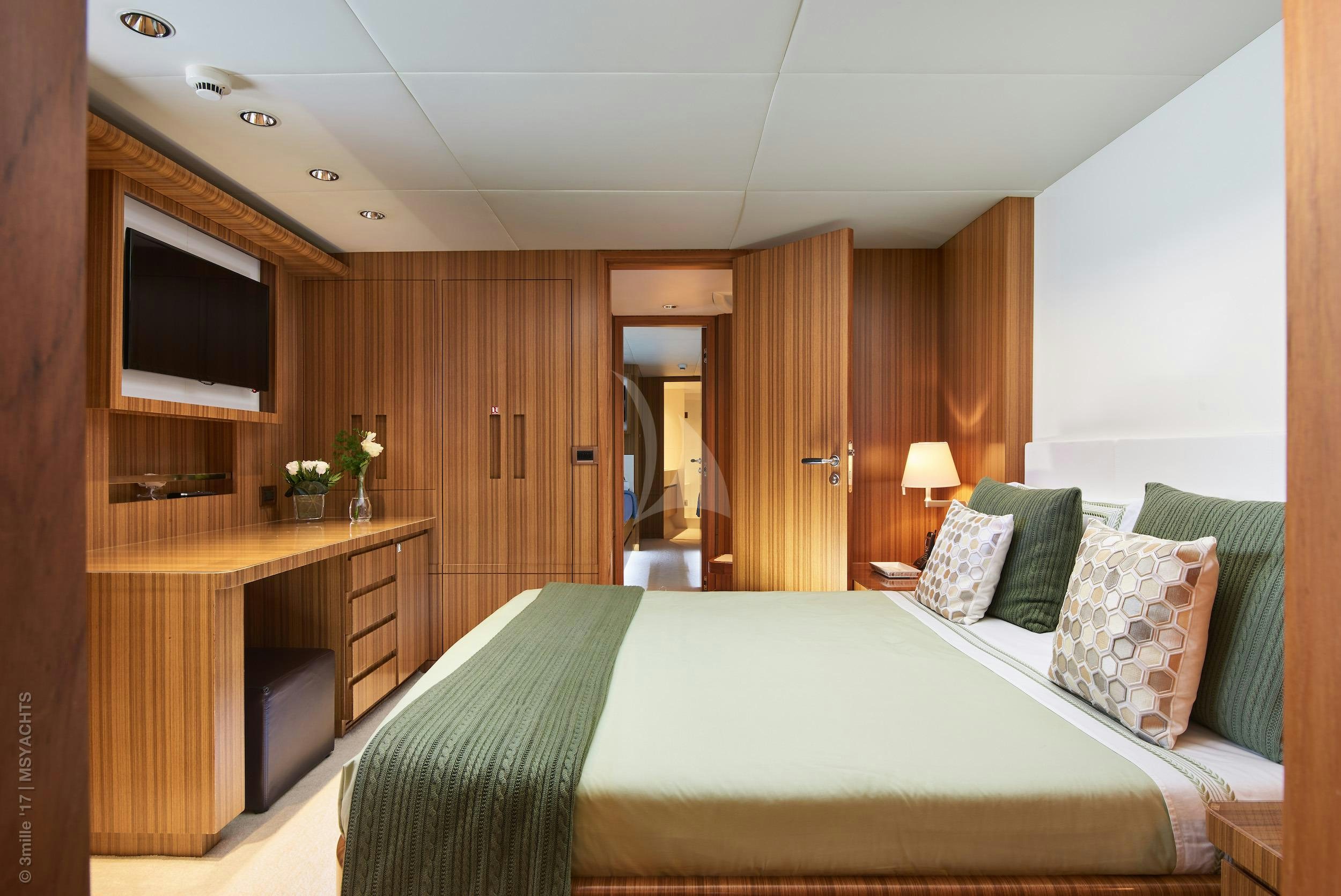 a hotel room with a bed aboard SEA SHELL Yacht for Charter