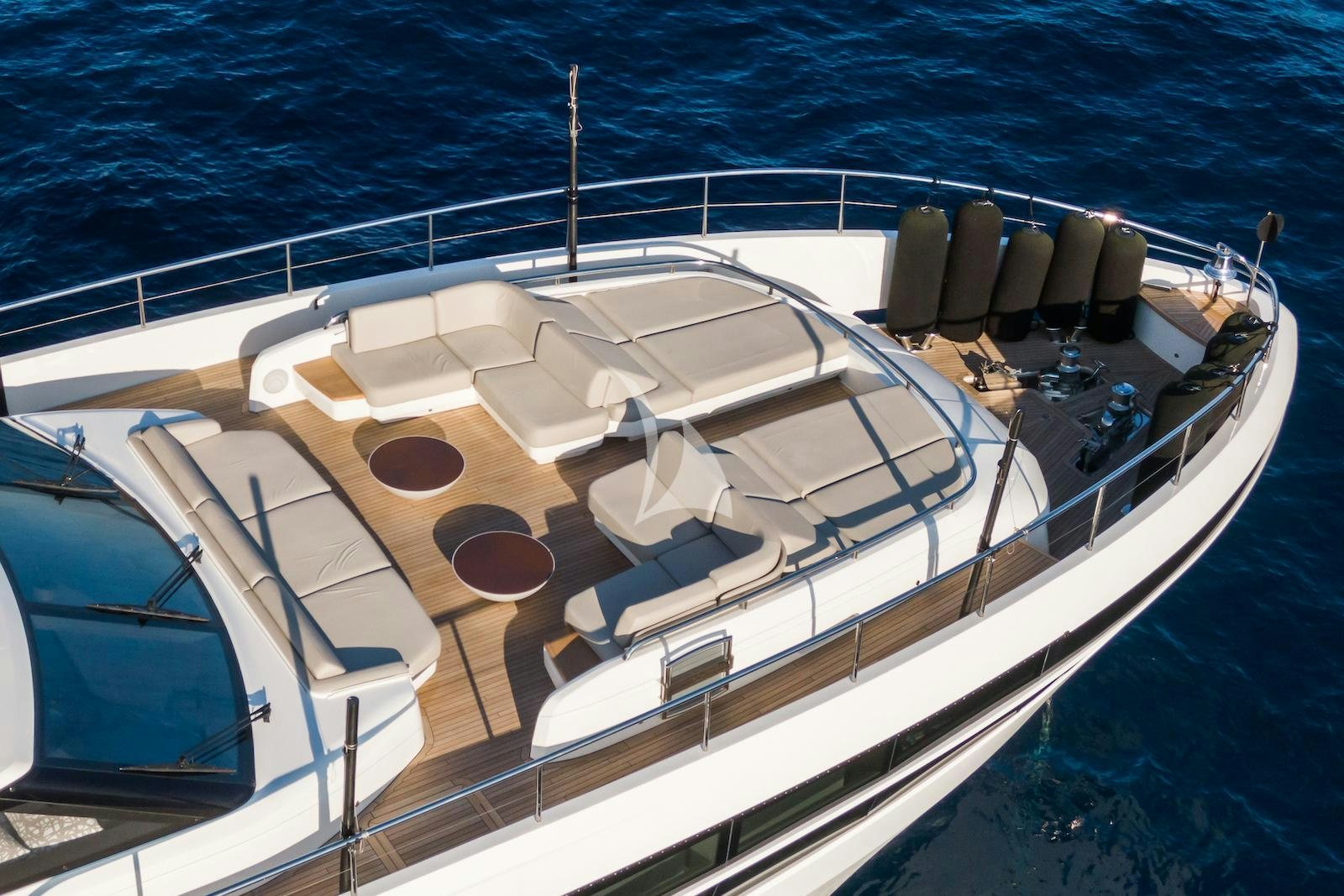 a large white ship with a large deck and a dock aboard MINOR FAMILY AFFAIR Yacht for Charter