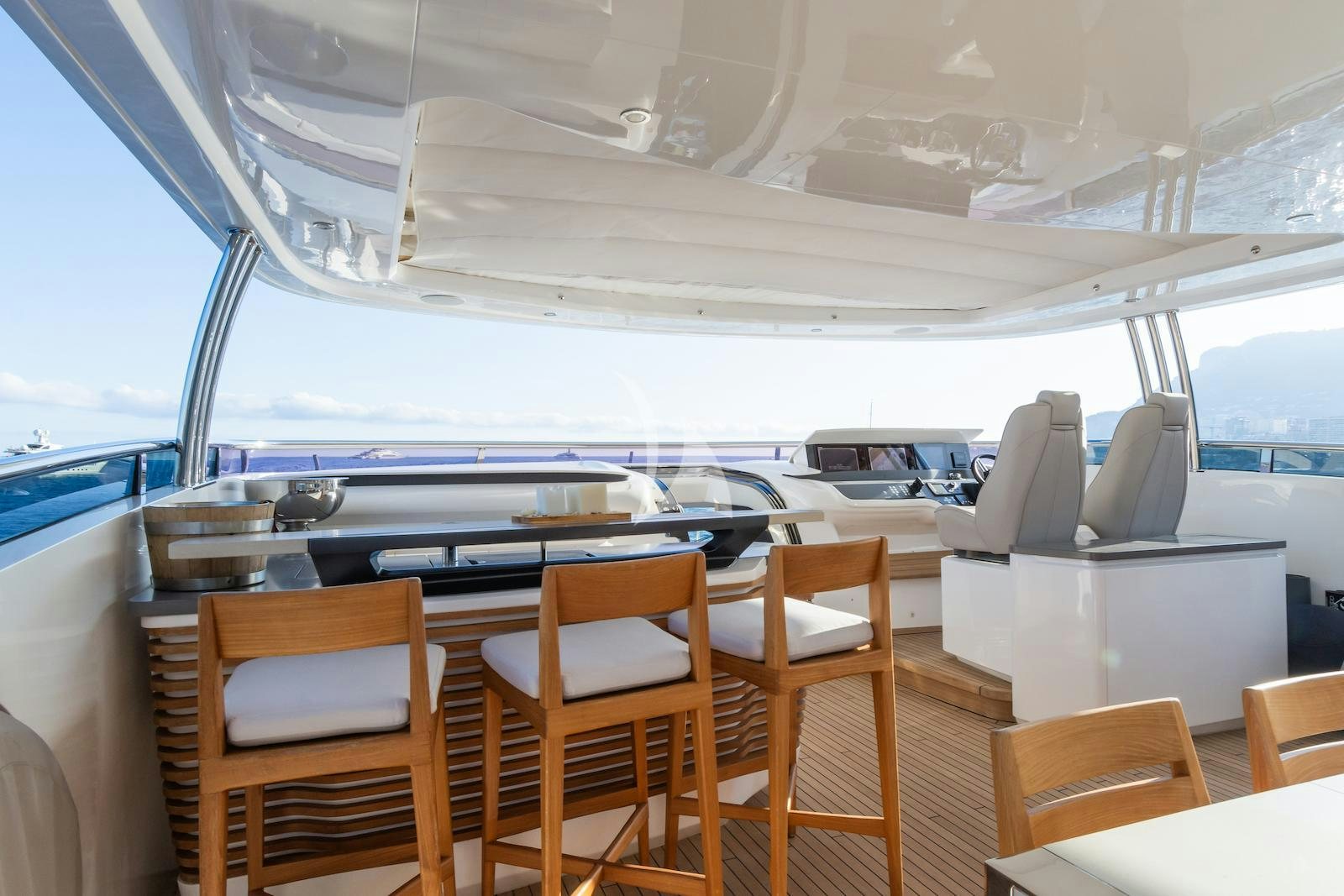 a boat with a deck and chairs aboard MINOR FAMILY AFFAIR Yacht for Charter