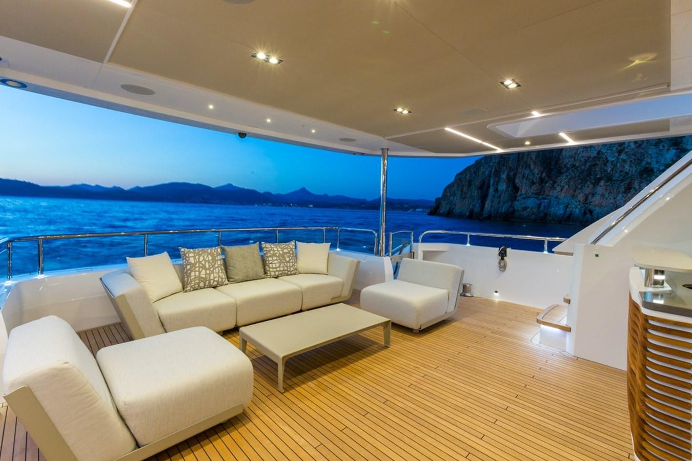 a living room with a large balcony aboard MINOR FAMILY AFFAIR Yacht for Charter