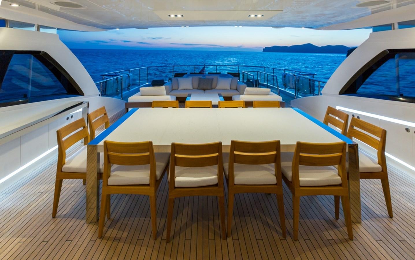 a boat with chairs and tables aboard MINOR FAMILY AFFAIR Yacht for Charter