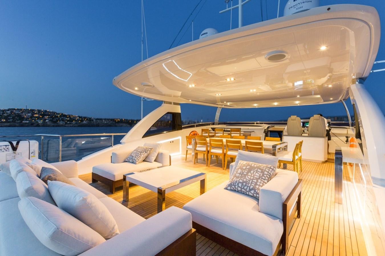 a large living room with a large balcony overlooking the ocean aboard MINOR FAMILY AFFAIR Yacht for Charter