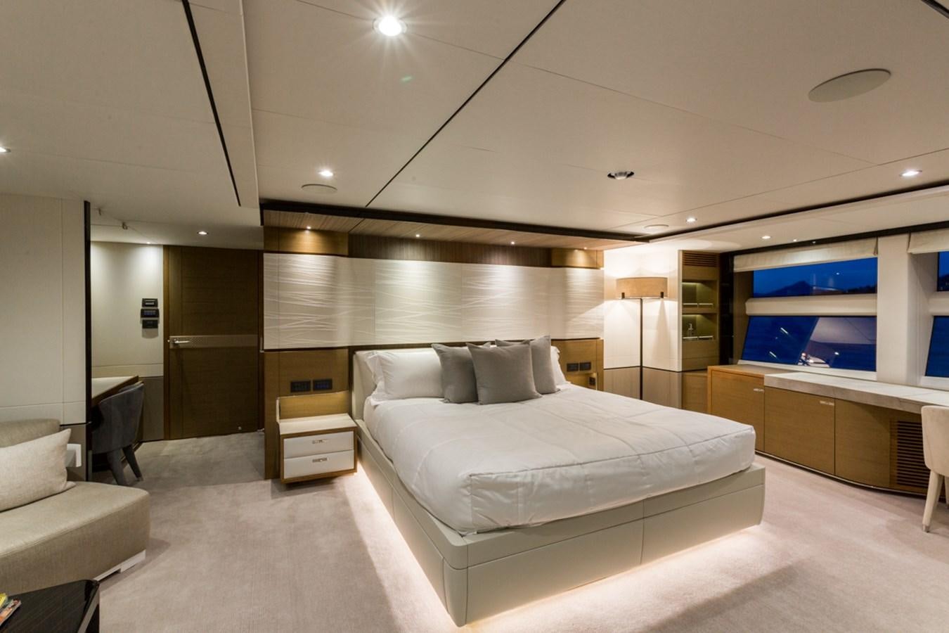 a large bedroom with a bed aboard MINOR FAMILY AFFAIR Yacht for Charter